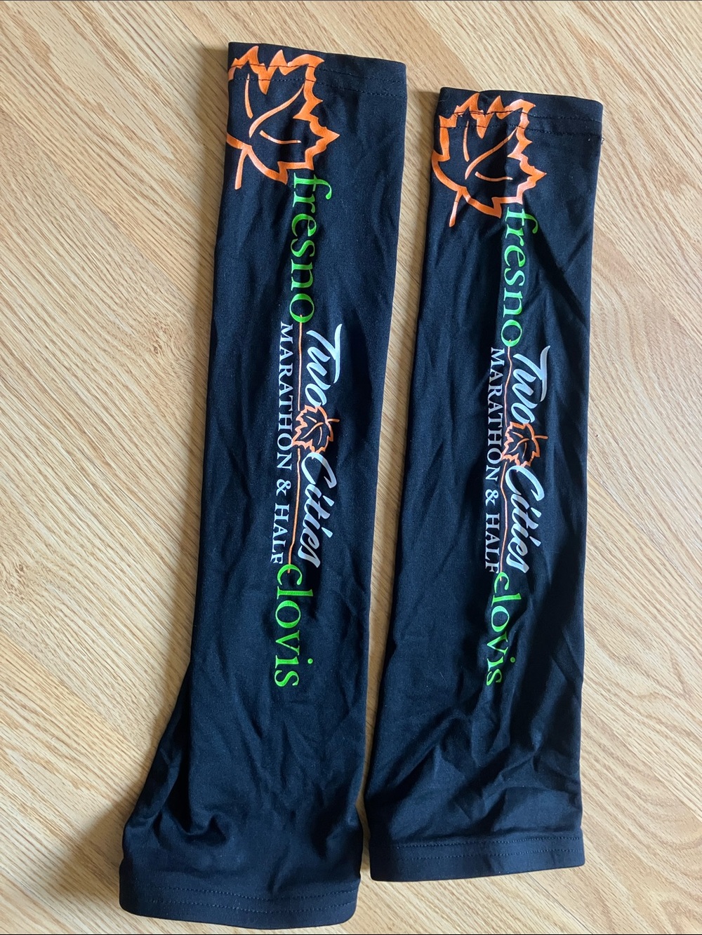 Fresno Clovis Marathon & Half Black Running Arm Sleeves with Orange Leaf Accent